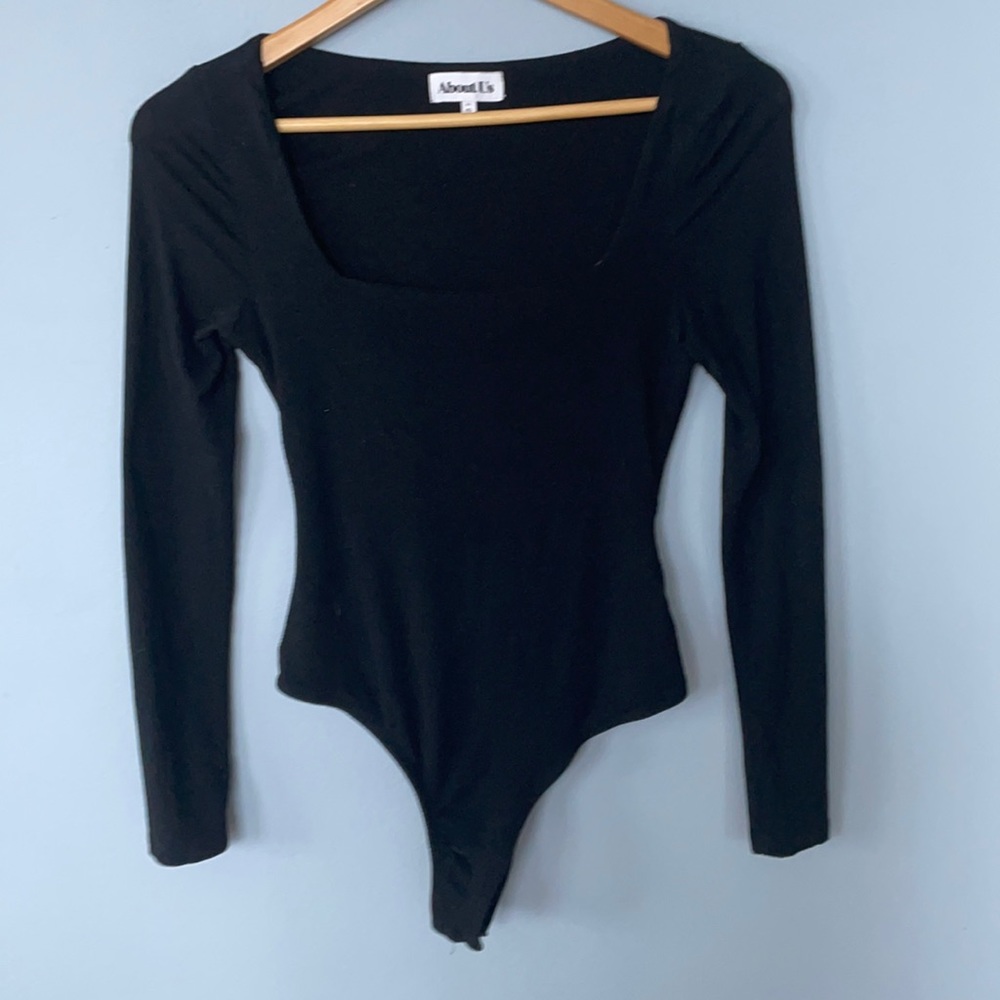 About us/ Revolve bodysuit